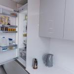 close up of the fridge area with fridge door open