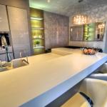 Gloss white kitchen with island and breakfast bar