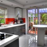 Tiered ceiling provides space for down lights over worktops