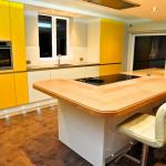 Keller high gloss fitted kitchen with island and AEG appliances