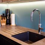 Undermount Reginox sink in midnight skyl colour with Quooker combi boiling hot tap.