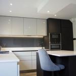 The wall units have LED underlighting and the one above the hob houses a very discreet extractor