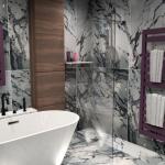 CAD image of bathroom design looking towards the bath and shower enclosure.
