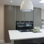 Family kitchen handleless with sharknose edged Corian tops and a mix of gloss and matt doors