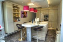 kitchen with centre island and breakfast bar