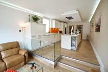Keller fitted kitchen featuring Corian Neff and Amtico products