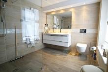 luxurious large en-suite wetroom with Laufen vanity unit